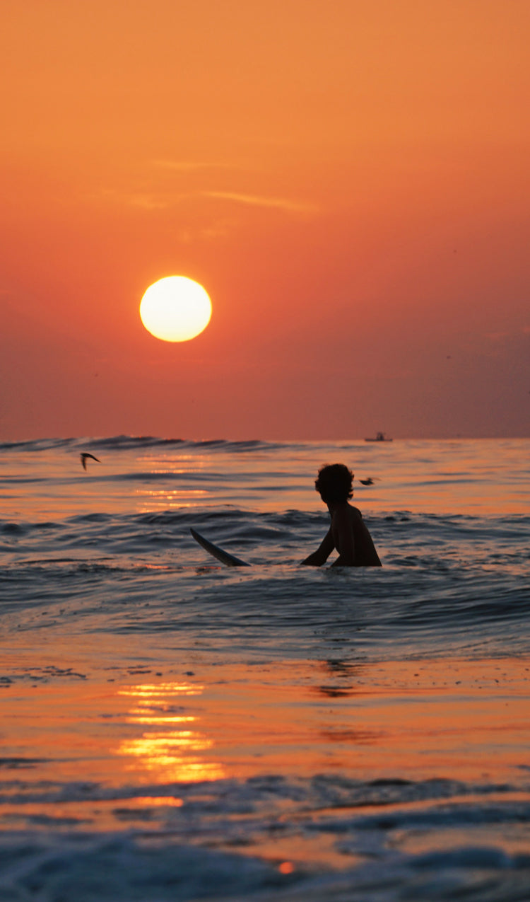 Surfing at Sunset