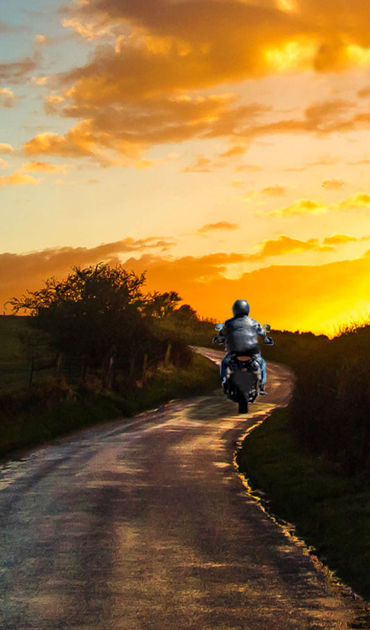 Riding Motorcyle into the Sunset