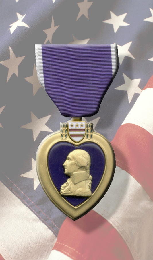Purple Heart Medal over U.S. Flag
